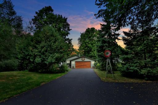 Nestled in the Pines....29166 Glader Boulevard Welcomes You!