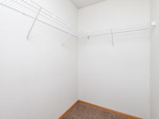 6x5 primary walk-in closet provides convenient storage
