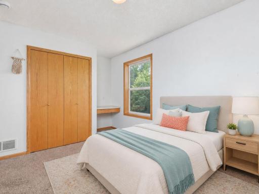 Bedroom 2 - AI virtually staged with furniture added to help illustrate the roomâs scale, layout, and potential use of space.