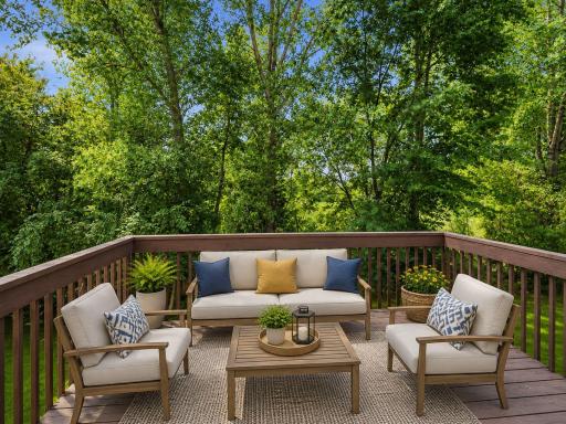 AI virtually staged to illustrate outdoor furniture placement. 12x10 deck creates a comfortable outdoor living space surrounded by mature trees.