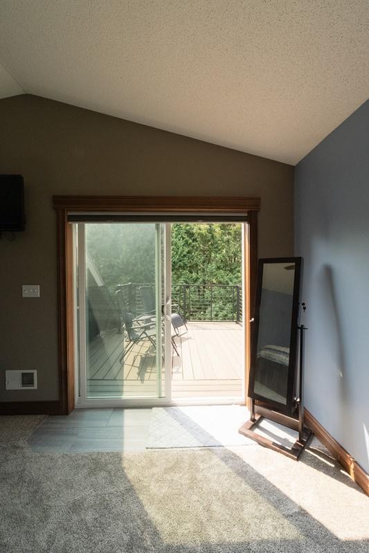 Patio doors leading to private deck