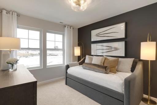 Photo is of a similar model home.