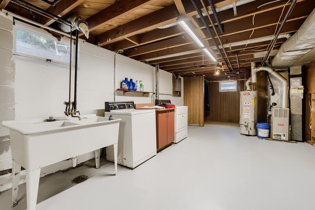 Huge laundry room and storage room. Lower level does need some repairs and home does have a well. Seller to assume Richfield Time of Sale repairs.