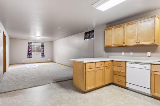 Lower-level guest suite with separate garage entrance