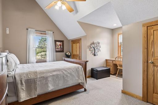 One of two upper-level bedrooms