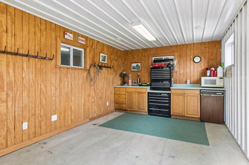 Complete with power, water and heated floors under the finished cement area
