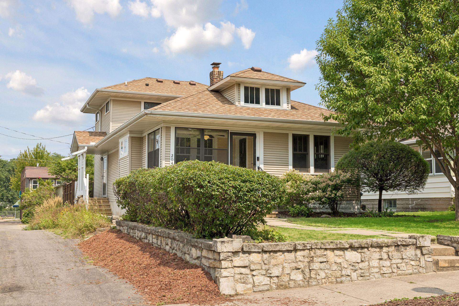 The home features extensive natural stonework - sidewalks and steps, retaining walls, decorative art and rear paver patio. Plus updated gardens and perennials.