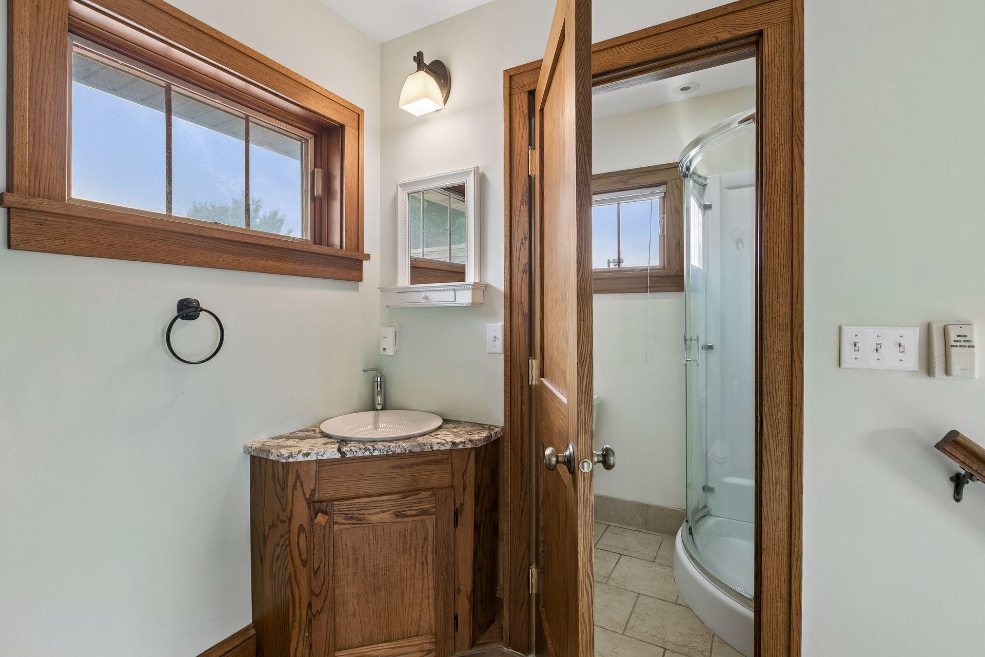 The space provides a 3/4 bath with walk-in shower.