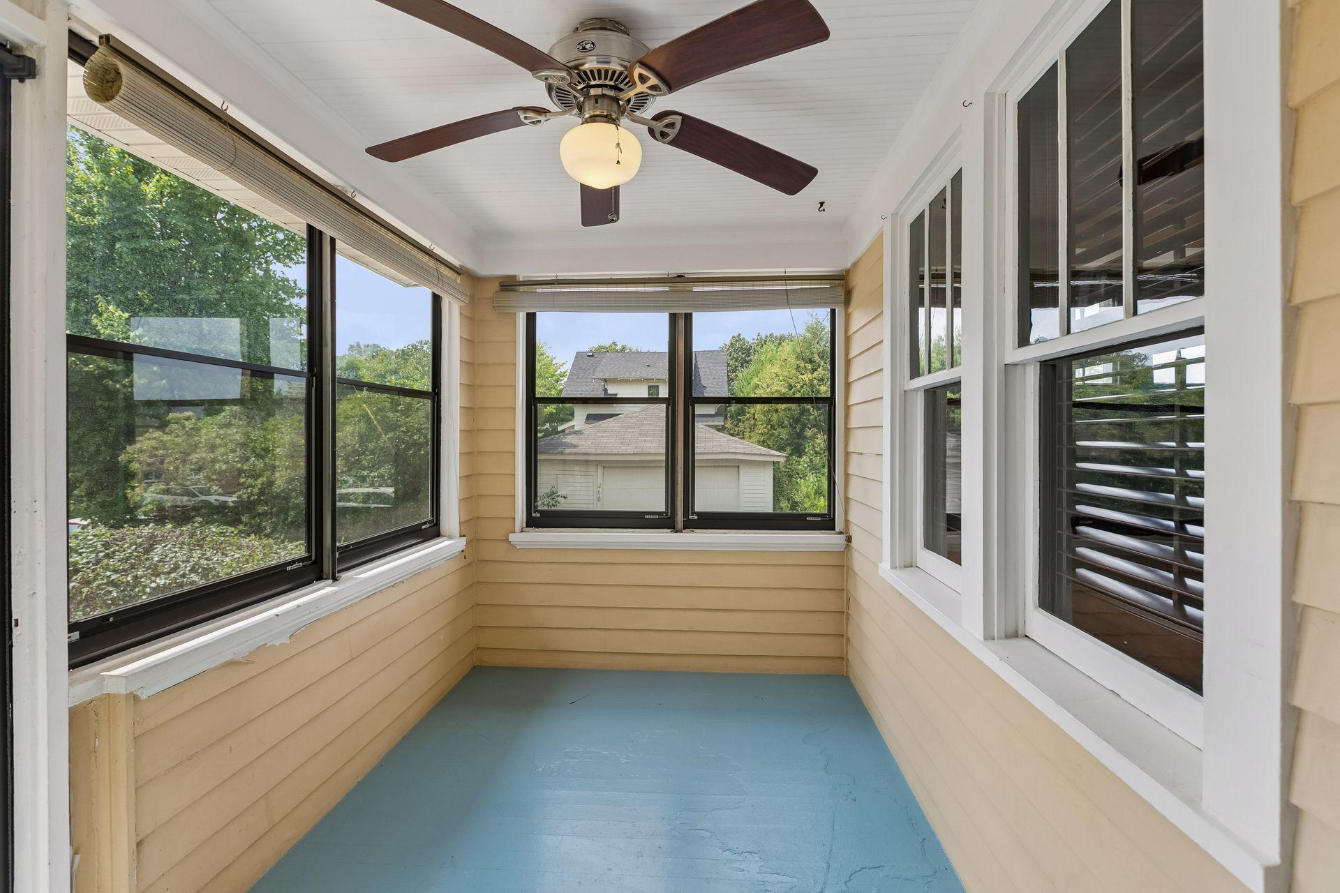 South facing enclosed front porch.