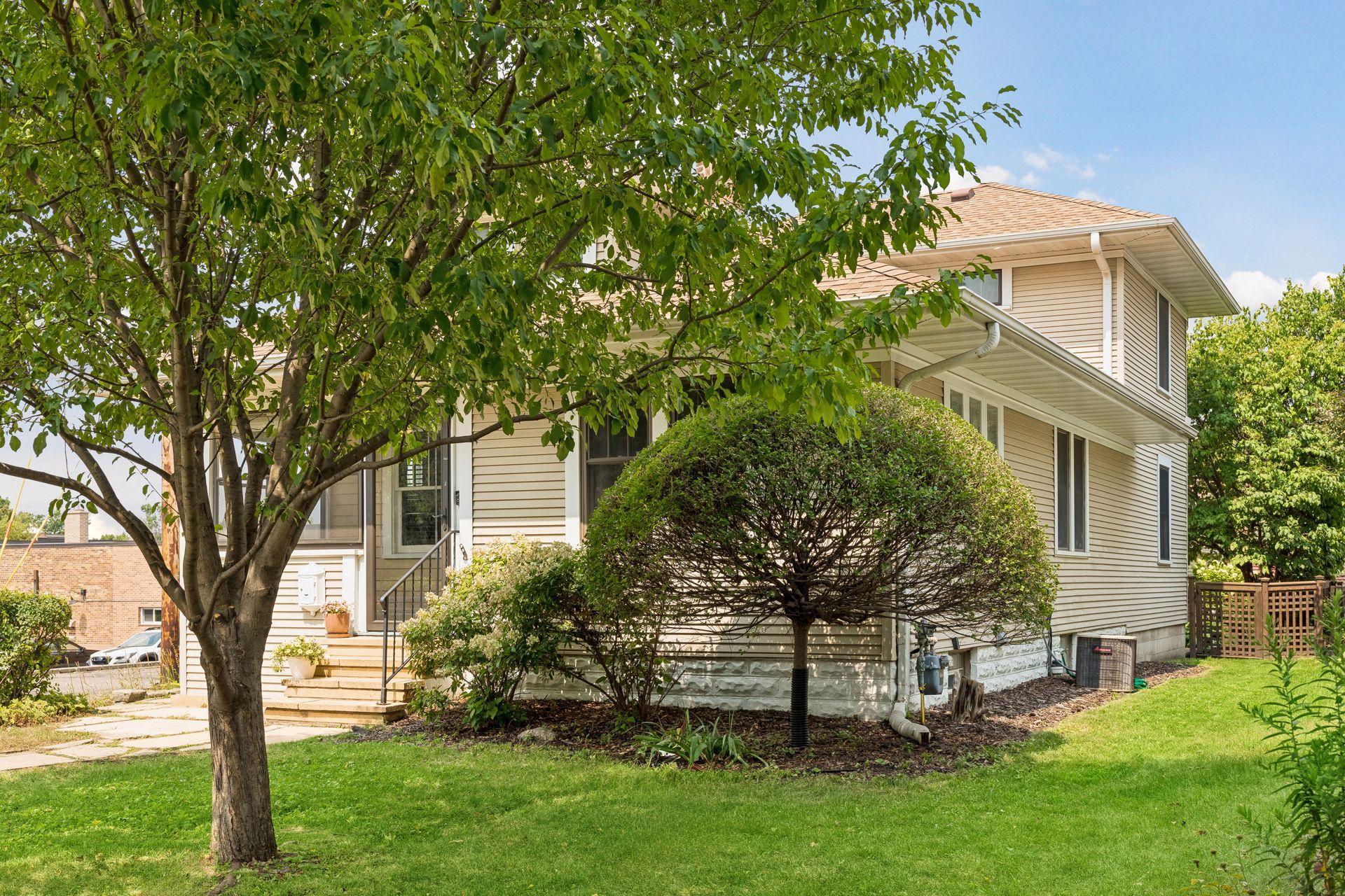 An addition created a rear second story owners suite and expanded the main floor.