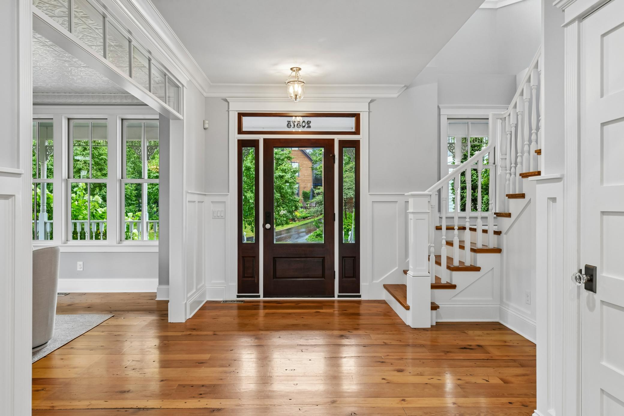Foyer with reclaimed barnwood floors
