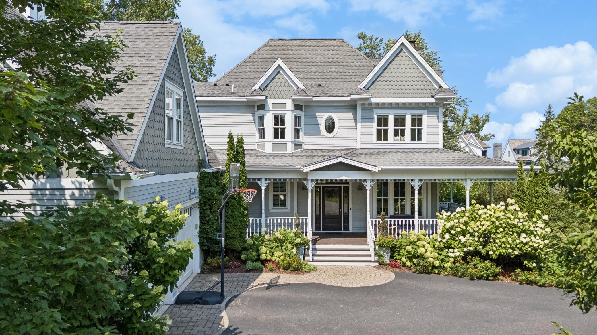 Beautiful curb appeal on 0.58 private acres