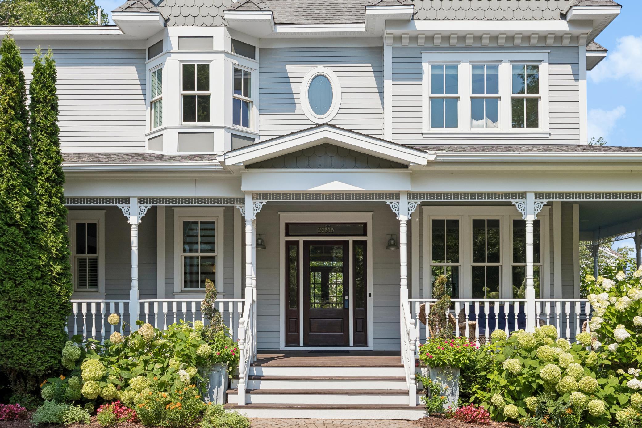 Covered front portico and stone walkway