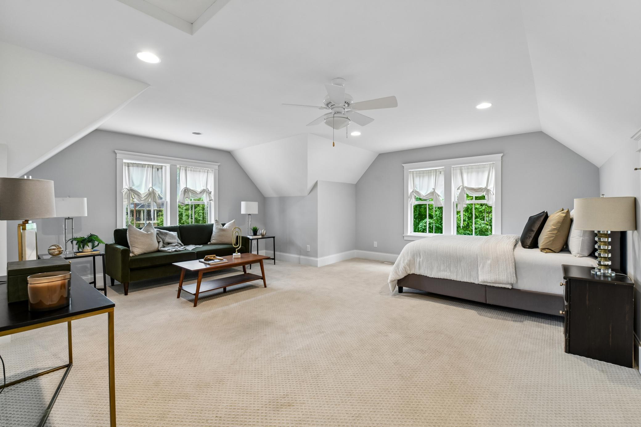 Private staircase to guest suite, with sitting area, and bathroom