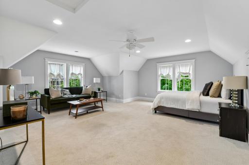 Private staircase to guest suite, with sitting area, and bathroom