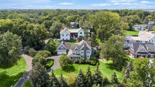Aerial view â private lot, surrounded by mature trees