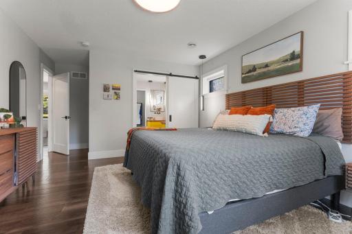 The primary bedroom features a private bath and large walk-in closet