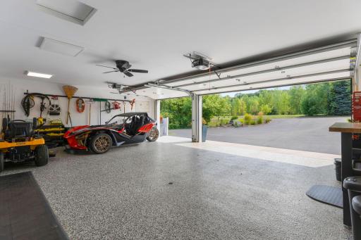 Epoxy floors, heated & insulated, ceiling fan, floor drain and cabinet space