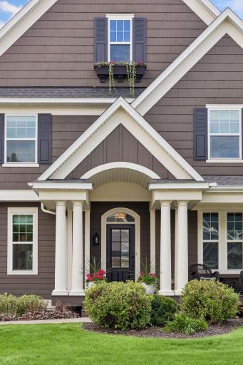 The barrel vault on the front porch adds beautiful detailing to this home