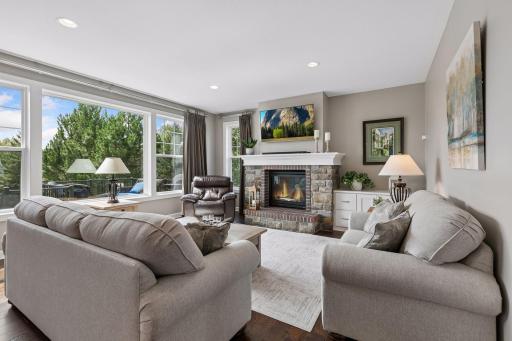Lovely great room off the kitchen keeps you connected to family