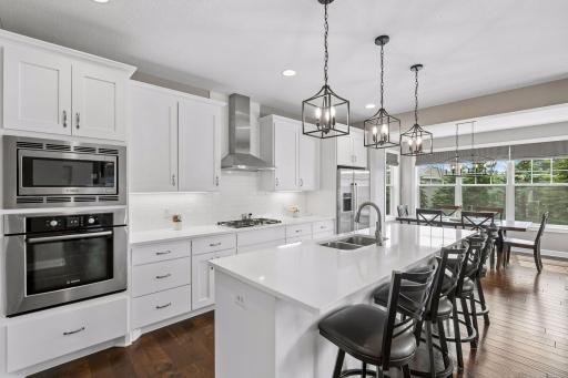 The open floor plan keeps you connected to your family and guests while entertaining
