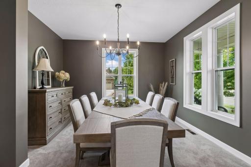 Formal dining room with lovely front yard views