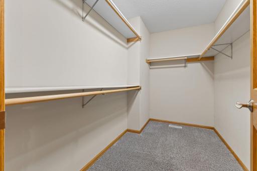 Spacious primary walk-in closet