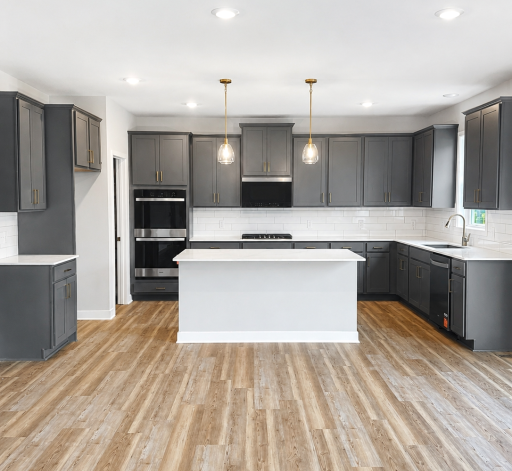 Welcome home to 919 Foxglove Terrace! Pictured is the actual home, featuring our beautiful Signature kitchen with quartz countertops, double ovens and elevated finishes throughout.