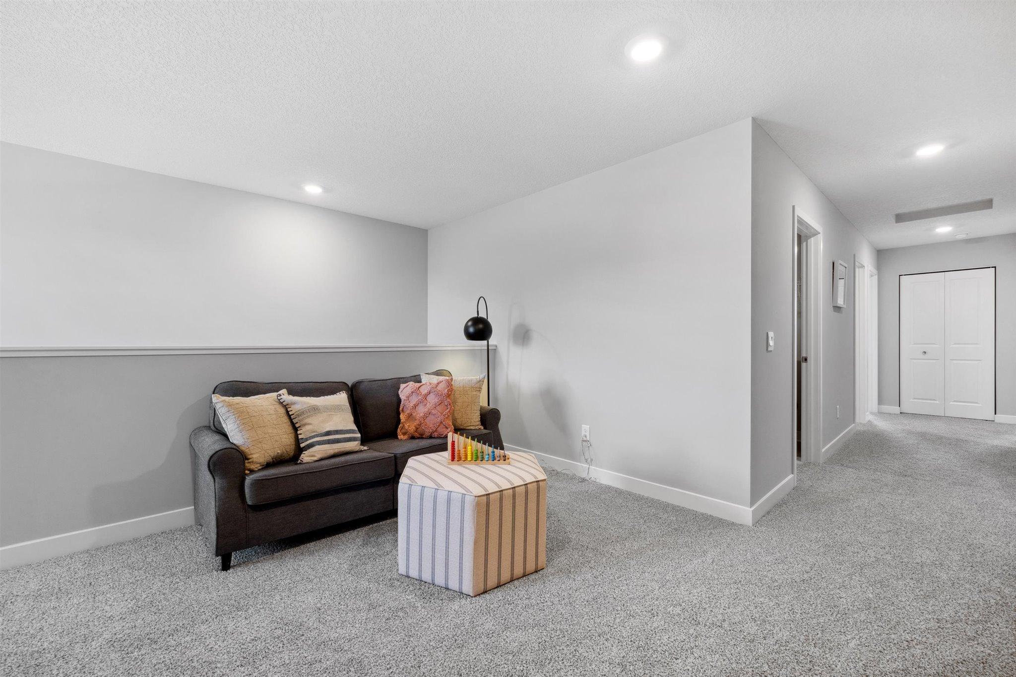 Upstairs loft. *Photo is of a past model home, finishes, selections, layout to vary.