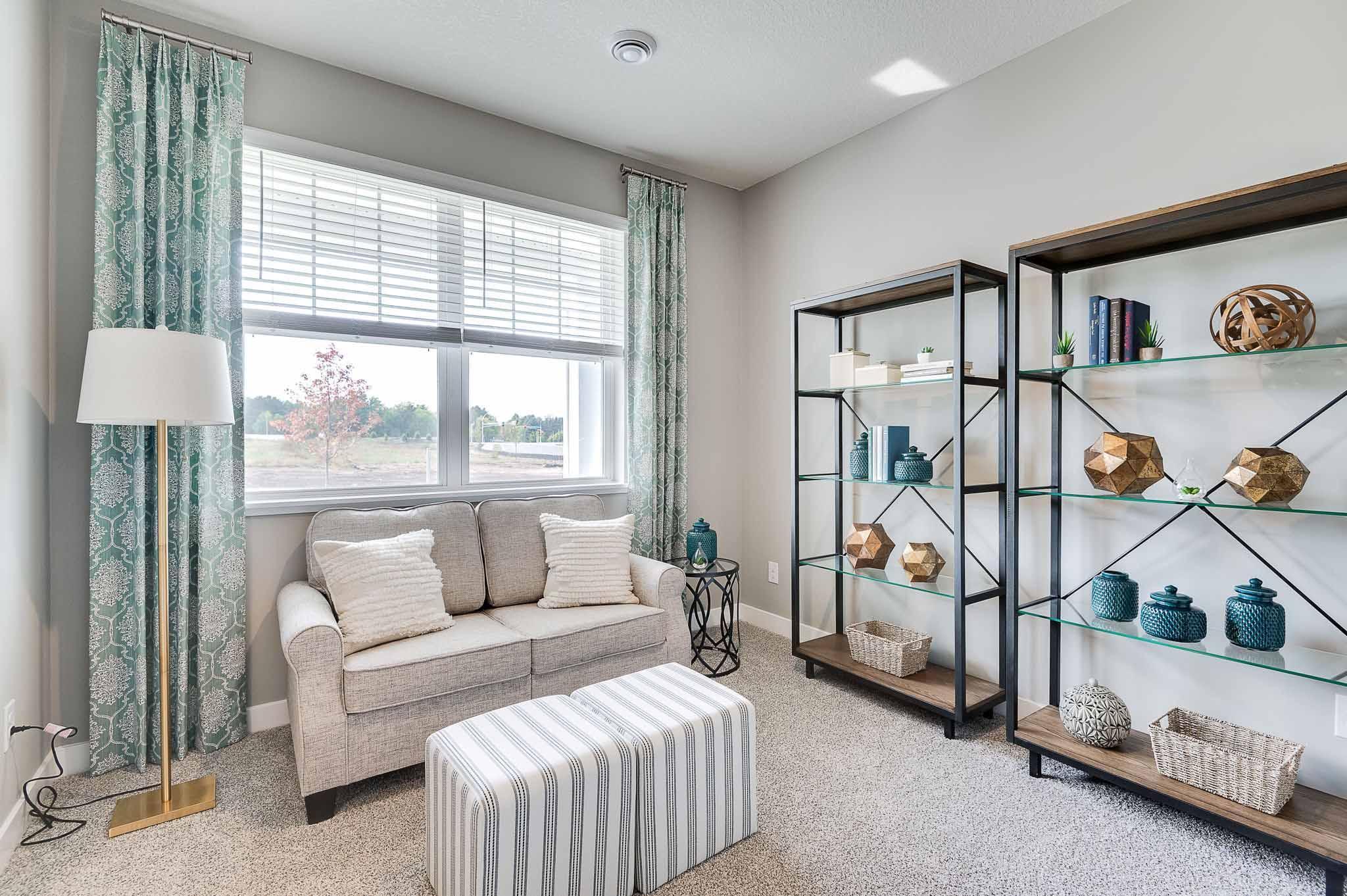 Main floor flex room creates a versatile space for you to use how you want. Photo of model home, color & options may vary.