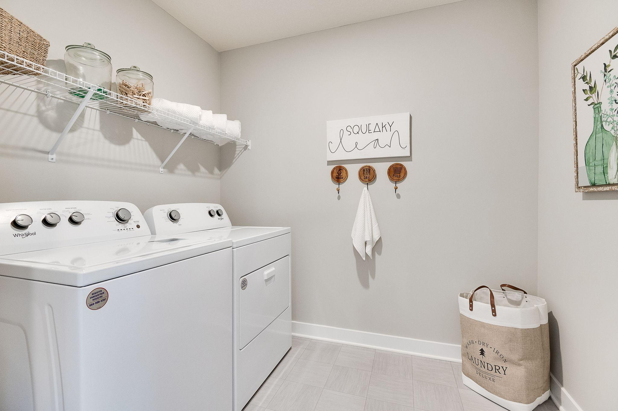 Life's simple pleasures - this one in the form of upper level laundry, just steps from each of the home's upper level bedroom!! Photo of model home, color & options may vary.