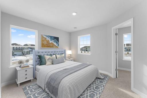 Each of the secondary bedrooms on the upper level have their own walk-in closet. *Picture is of model home actual finishes may vary.