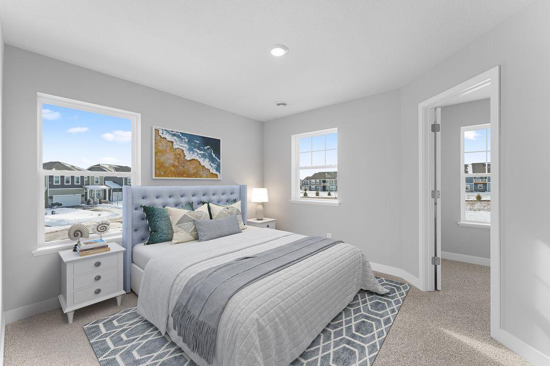 The additional upper-level bedrooms are very spacious and have their own walk-in closets! Virtually staged.