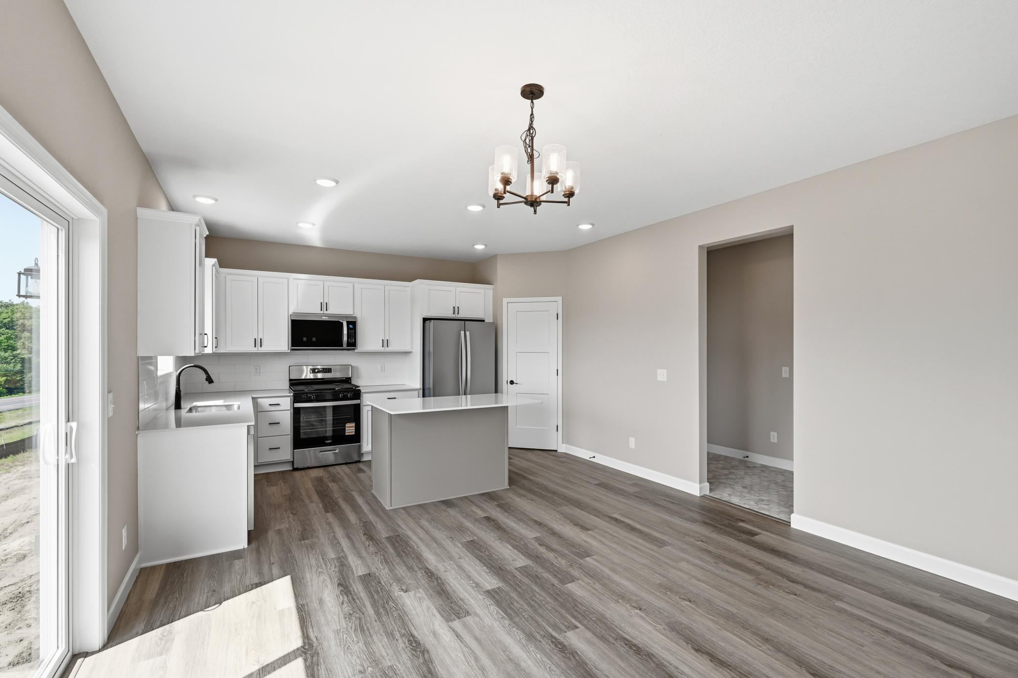 Kitchen/Dining - photos of a completed home of the same floorplan. Colors and selections may differ.