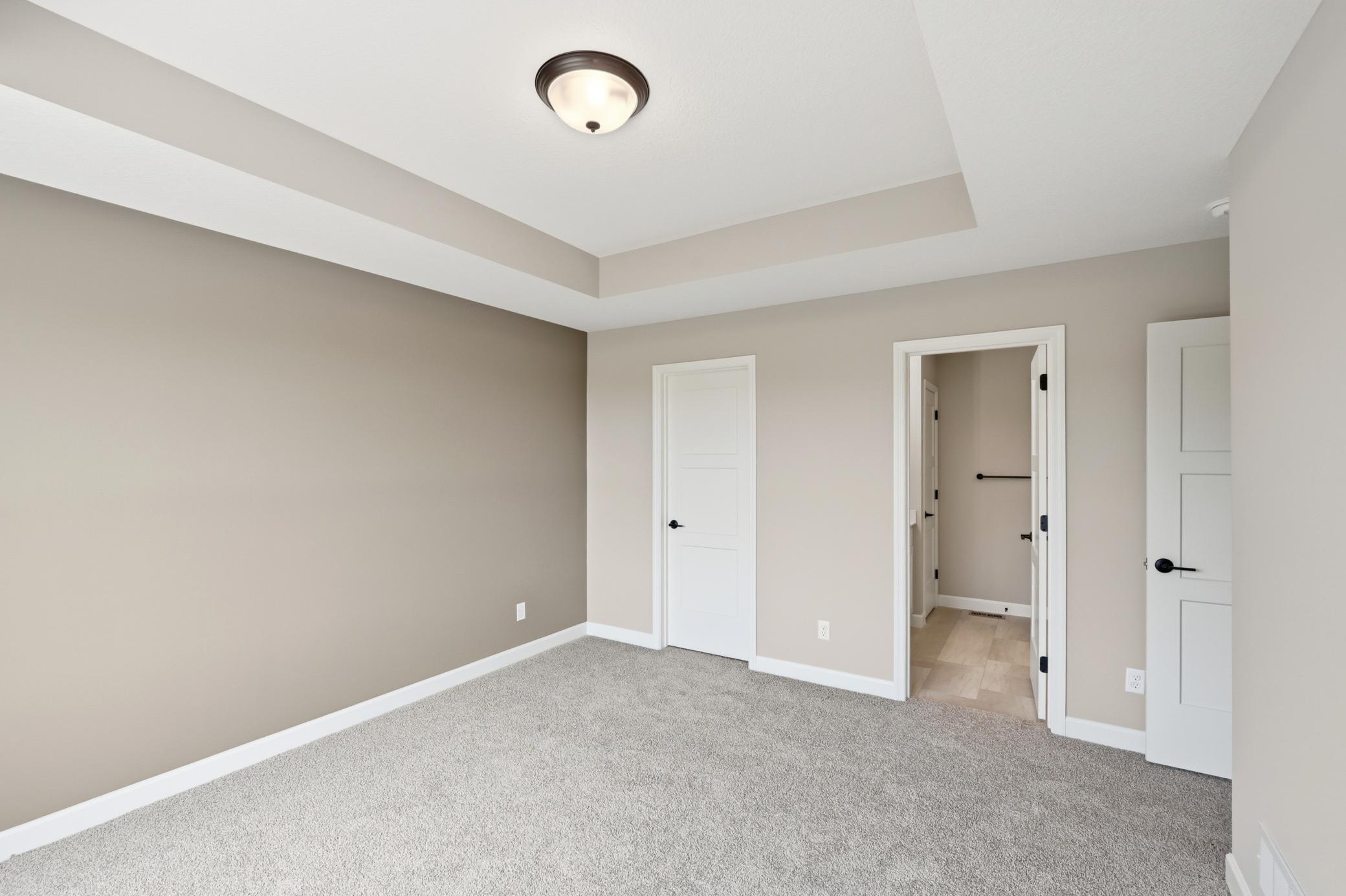 Primary suite - photos of a completed home of the same floorplan. Colors and selections may differ.