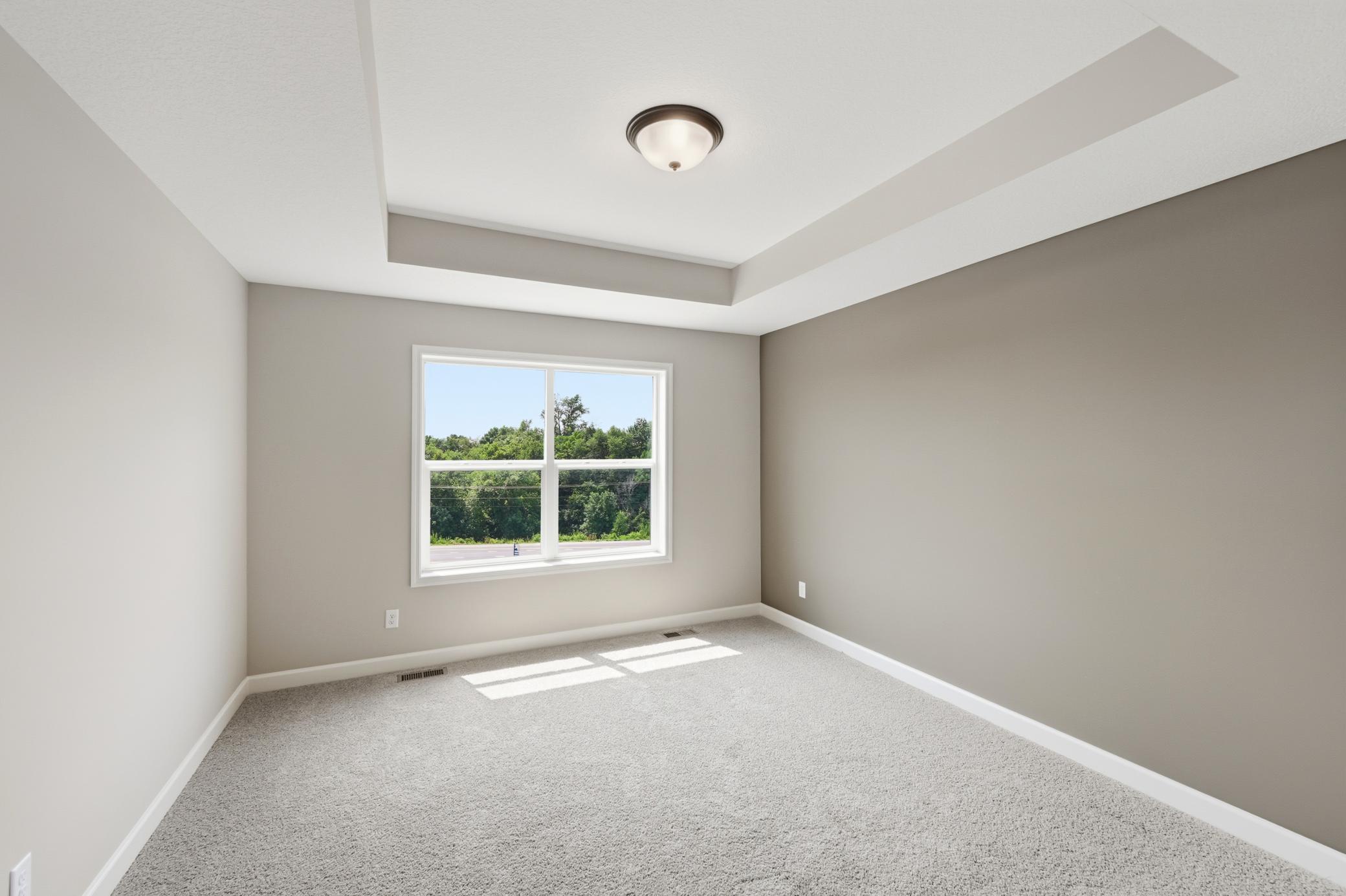 Primary suite - photos of a completed home of the same floorplan. Colors and selections may differ.