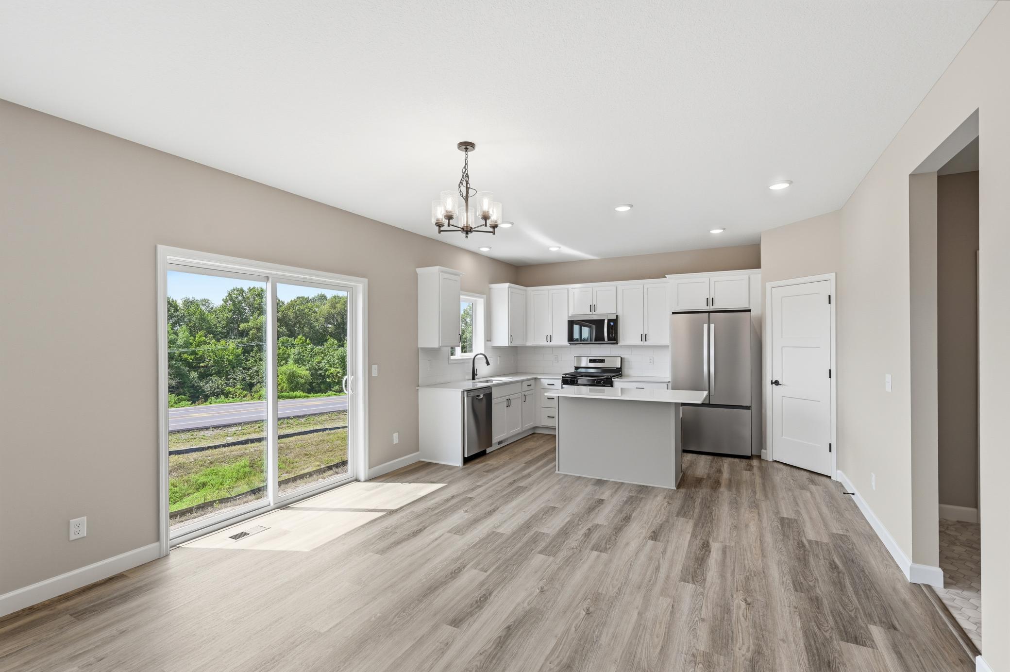 Kitchen/Dining - photos of a completed home of the same floorplan. Colors and selections may differ.