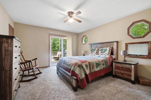Main floor bedroom with deck doors