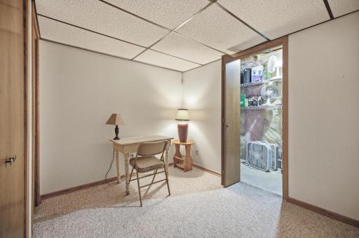 Den with utility closet