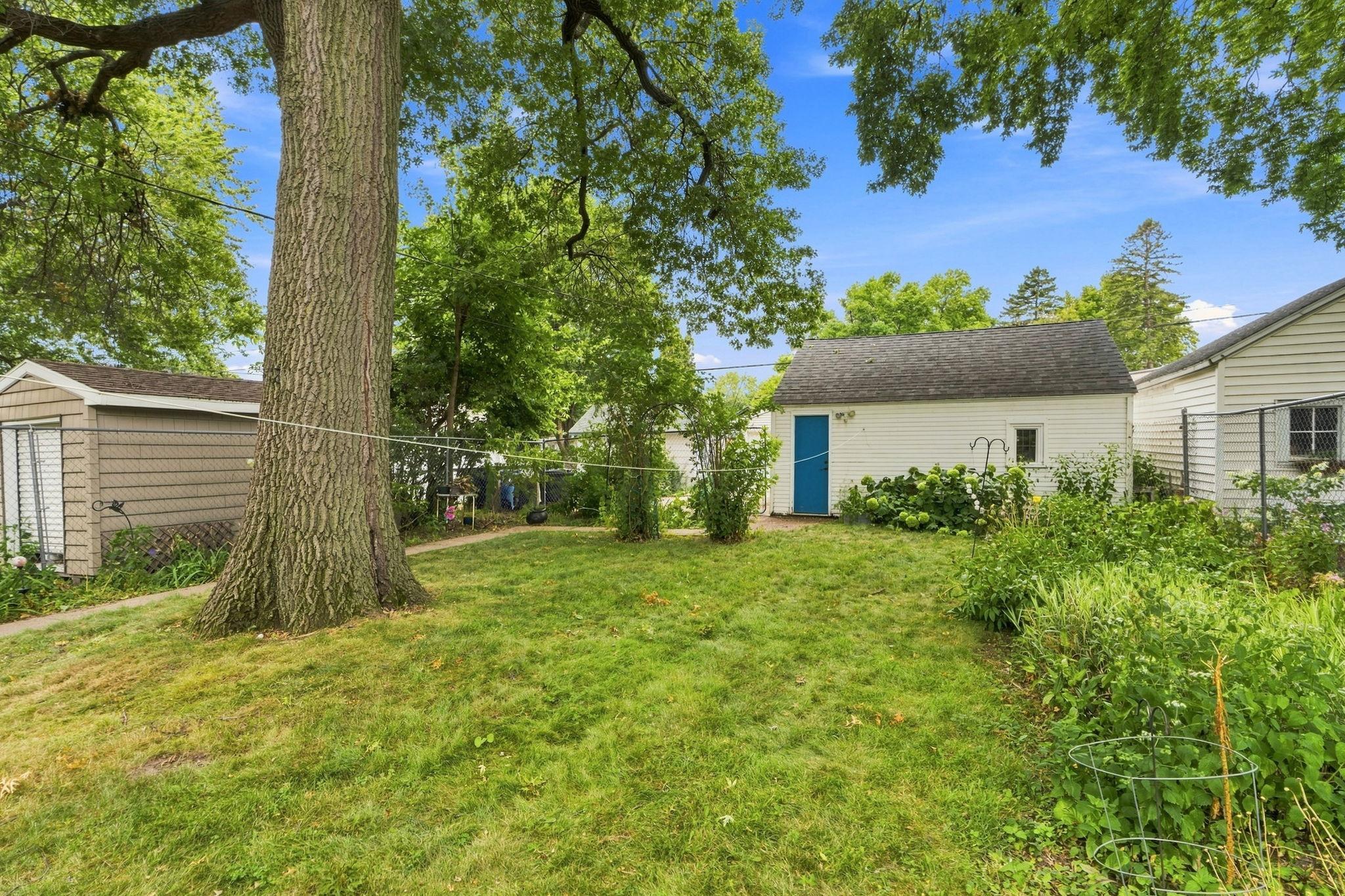 Enjoy summer days in this shaded backyard