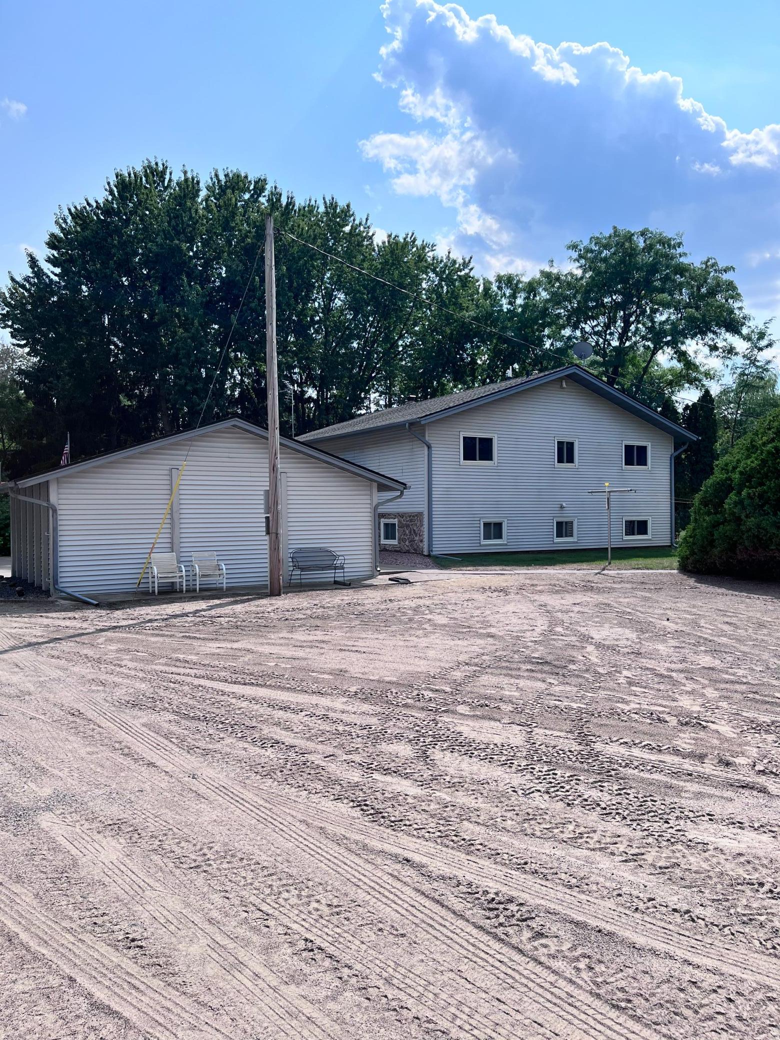 Rear view of home and garage.