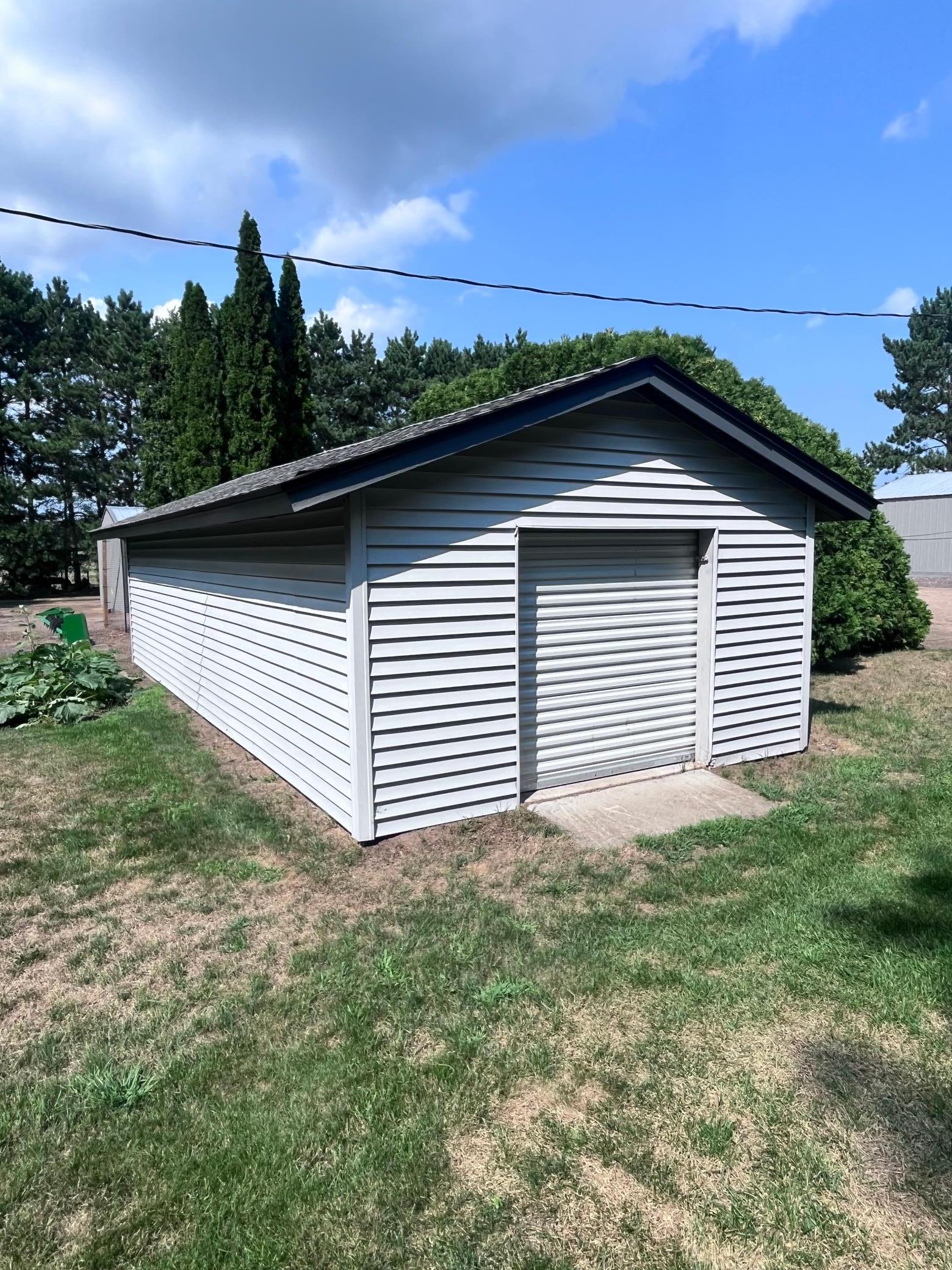 12' x 24' storage shed with single roll up door.