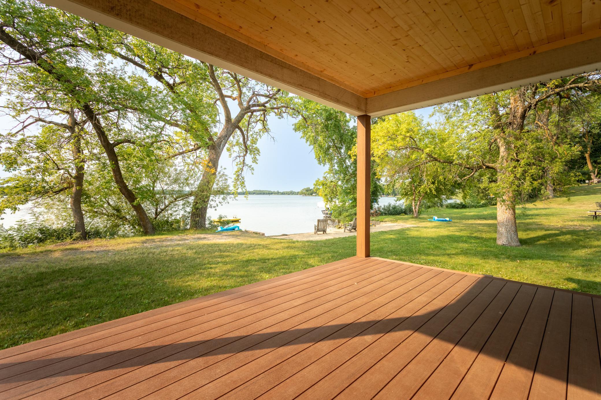 View of beach and lake from deck