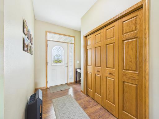 Entryway w/ large closet & pretty front door