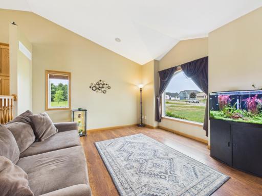 Spacious living room w/ large picture window provides great natural light on the main level