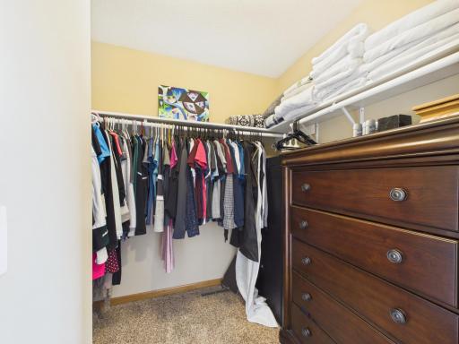 Primary bedroom walk-in closet
