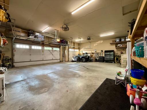 Insulated 3-stall garage heated w/ pellet stove