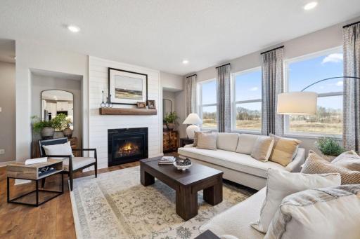Home for sale will have the same full wall of shiplap and the rustic mantle shown here.