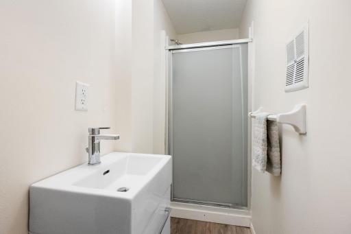 Convenient 3/4 bath near the kitchen on the main level.
