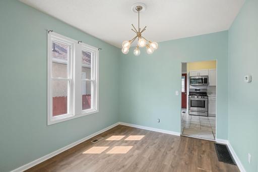 The updated light fixture adds a little punch to the dining room.
